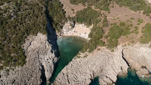 Aerial view of the iconic beach of Glossa near Voidokilia beach in Romanos Ar Stock Footage 202235848