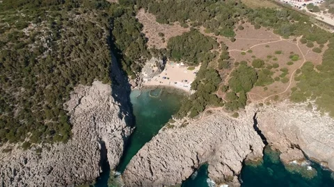 Aerial view of the iconic beach of Glossa near Voidokilia beach in Romanos Ar 스톡 동영상 202260986