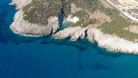 Aerial view of the iconic beach of Glossa near Voidokilia beach in Romanos Ar Stock Footage 202284141