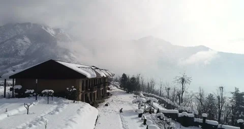 Aerial view of the iconic Dal Lake turned into a sheet of ice during deep Stock Footage 310656433