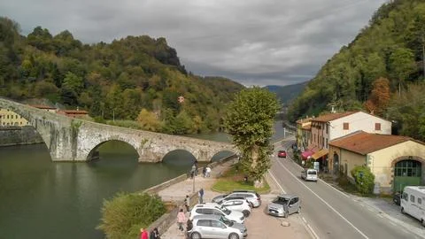 Aerial view of the iconic Devils Bridge in Tuscany, Italy, surrounded by sc.. Stock Photos