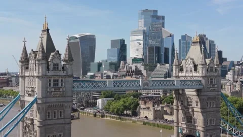 Aerial view of iconic London tower bridge crossing river Thames with modern.. Stock Footage 337689268