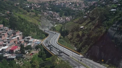 Aerial view from  the iconic Metrocable (cable car) system over Comuna 13 Vídeo Stock 168253338