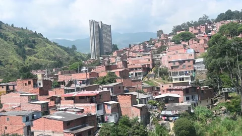 Aerial view from  the iconic Metrocable (cable car) system over Comuna 13 Vídeo Stock 168253585