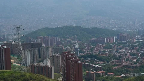 Aerial view from  the iconic Metrocable (cable car) system over Comuna 13 Vídeo Stock 168254249