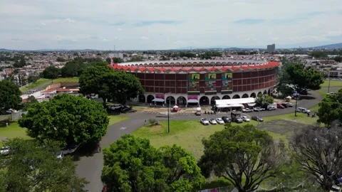 Aerial view of the iconic Nuevo Progreso bullring in Guadalajara city Stock Footage 334897002