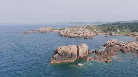 Aerial view of the iconic pink granite rocks along the coastline at Ploumanach Stock Footage 346665089