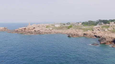 Aerial view of the iconic pink granite coastline of Perros-Guirec along the Stock Footage 346666098