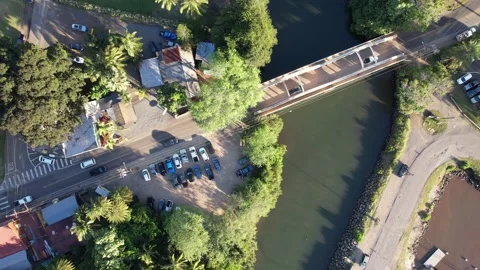 Aerial view of iconic Rainbow Bridge and historic Haleiwa Vídeo Stock 169612892