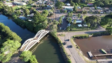 Aerial view of iconic Rainbow Bridge and historic Haleiwa, Hawaii Stock Footage 169612941