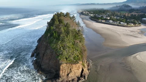 Aerial View of a Iconic Sea Stack and Beach on Coast of Oregon Stock Footage 292666207