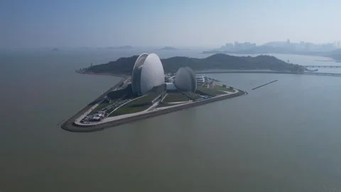Aerial view of the iconic Sun Moon Shell opera house in Zhuhai coastal city Stock-Footage 342281229