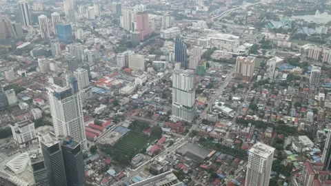 Aerial view of iconic tower and other building in Kuala Lumpur Stock Footage 150289943