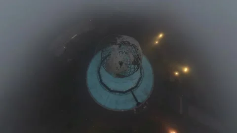 An aerial view of the iconic Unisphere in Flushing Meadows Corona Park on a Stock Footage 333290843