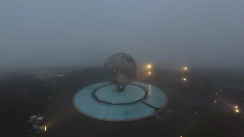 An aerial view of the iconic Unisphere in Flushing Meadows Corona Park on a Stock Footage 333290847