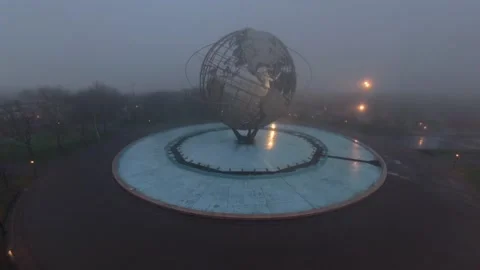 Aerial view of the iconic Unisphere in Flushing Meadows Corona Park on a foggy Stock Footage 333345066