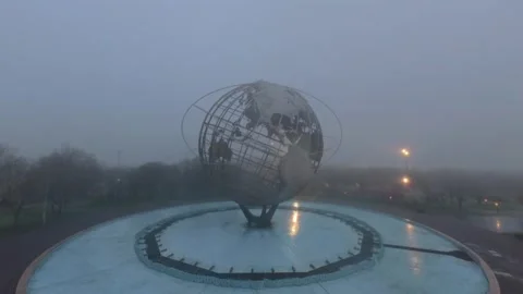 An aerial view of the iconic Unisphere in Flushing Meadows Corona Park on a Stock Footage 333347438