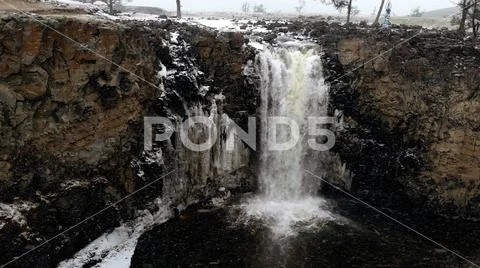 Aerial view of icy Orkhon waterfall during a cold Mongolian winter Stock Photos