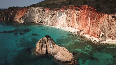 Aerial view of idyllic sandy beach with motor boat Stock Footage 92480060