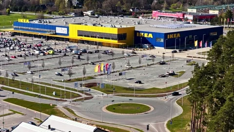 Aerial view of IKEA store, roundabout traffic and large customer parking lot Stock-Footage 336697056