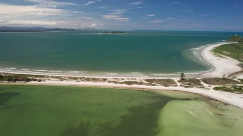 Aerial View of Ilha do Mel Coastline with Green Water and Distant Island Stockbeeldmateriaal 336455774
