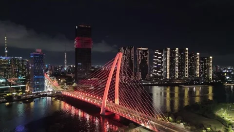 Aerial view of illuminated Ba Son Bridge through Saigon river. Stock Footage 345310539