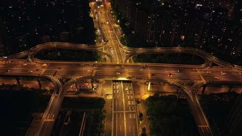 Aerial view of illuminated interchange at night in Hangzhou, China featuring Stock-Footage 314604744