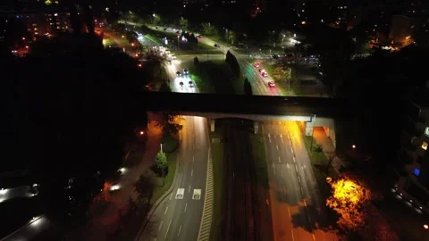 Aerial view of illuminated urban intersection at night Video stock 331809108