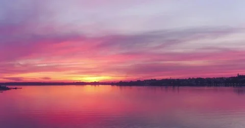 Aerial view incredibly beautiful pink sunset over the river Stock Footage