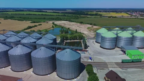 Aerial view of industrial agricultural elevator plant with storage silos Stock Footage 341284544