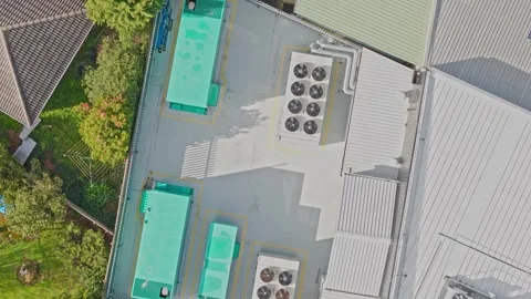 Aerial view of industrial building rooftop hvac units Stock Footage 340594792