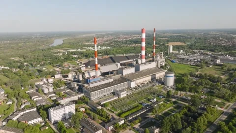 Aerial view of industrial coal fired power plant chimneys Stock Footage 344879774