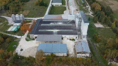 Aerial view of industrial complex of kaolin clay (kaolinite) processing factory Stock Footage 119585170