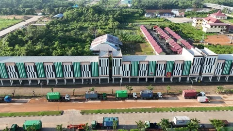 Aerial View of Industrial Complex with Long Facades and Lorries Video stock 333399143