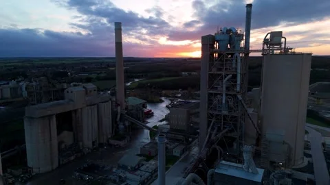 Aerial view of industrial complex with tall chimney, United Kingdom. Stock Footage 322198359