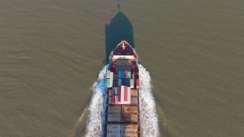 Aerial view of an industrial container cargo ship sailing over the sea Stock Footage 295960403