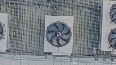 Aerial View of Industrial Cooling Fans on Data Center Rooftop for Technology Stock Footage 342037053