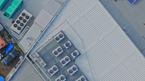 Aerial View of Industrial Data Center Rooftop with HVAC Units and Solar Panels Stock Footage 342037429