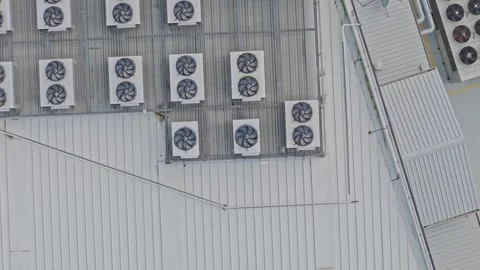 Aerial View of Industrial Data Centre Roof with Cooling Units and Ventilation Stock Footage 341501689