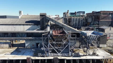 Aerial view of industrial factory complex on riverfront Stock-Footage 340512745
