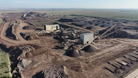 Aerial view of an industrial mining site with conveyor belts Stock Footage 339304326