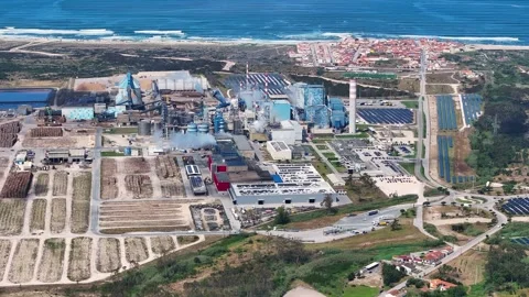 Aerial view of industrial pulp mill and solar panel farm Stock Footage 339674563