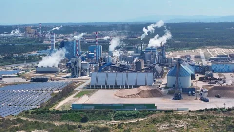 Aerial view of industrial pulp mill producing cellulose with biomass energy Stock Footage 340311817