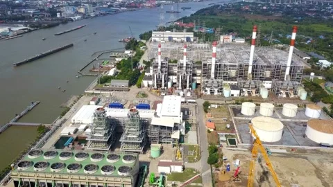 Aerial View of Industrial Refinery Complex by River Stock Footage 310991043