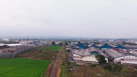 Aerial View of Industrial Rooftops Covered with Solar Panels in Indonesia Stock Footage 342247712