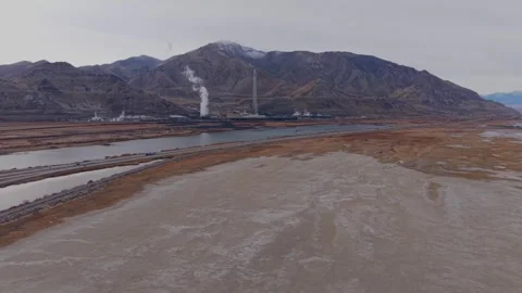 Aerial view of industrial smelter stack near Great Salt Lake in Magna, Utah Stock-Footage 333879433