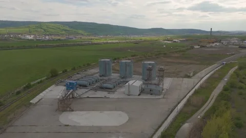 Aerial View of Industrial Storage Facility and Factory Tanks in Countryside  Stock Footage 335407634