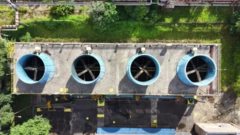 Aerial view of an industrial ventilation system with large blue fans Stock Footage 339576623