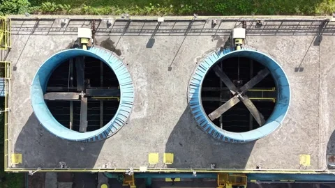 Aerial view of an industrial ventilation system with large blue fans Stock Footage 339576998