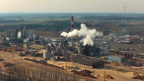 Aerial view of industrial wood processing plant emitting smoke Stock Footage 332615926